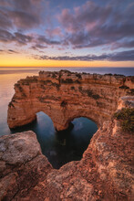 Heart shaped rock symbolising love on the coast of Portugal in Algarve