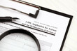 © mehaniq41 - I-589 Application for asylum and for withholding of removal blank form on A4 tablet, lies on office table with pen and magnifying glass close up