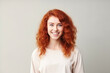 © koala studio - Portrait of a beautiful young woman with red hair, studio shot