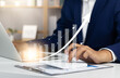 © GamePixel - Businessman analyzing financial data for long-term investment growth goals and company finance balance, Strategic business planning and marketing analysis for success for target. Finance strategy.
