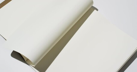 Canvas Print - Video of book with white blank pages and copy space on white background