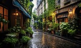 Fototapeta Uliczki - A cobblestone street lined with potted plants