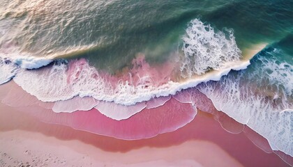 spectacular top view from drone photo of beautiful pink beach with relaxing sunlight sea water waves pounding the sand at the shore calmness and refreshing beach scenery