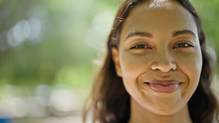 Wall Mural - African american woman smiling confident standing at park