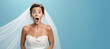 Surprised Bride on a Blue Background with Space for Copy