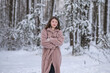 © shymar27 - Portrait of a young beautiful girl in a winter forest.