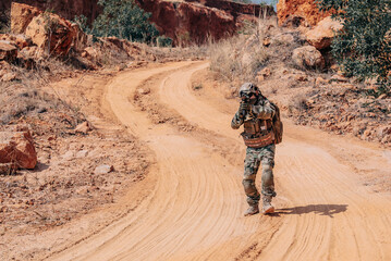 Wall Mural - Soldiers of special forces on wars at the desert,Thailand people,Army soldier Walking patrol.