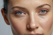 Close-up portrait of a young Caucasian model with clean beautiful skin.