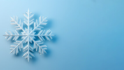 Wall Mural - Light blue background with a 3D snowflake, space for copy or text