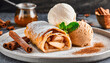 close-up shot of Apple strudel and cinnamon with ice cream ball