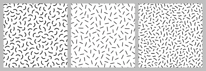 Wall Mural - Small dash pattern on white background set. Hand drawn small black dash seamless pattern. Simple minimal abstract, geometric texture design seamless background. Vector illustration