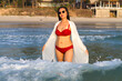 Woman body pretty with red  bikini on beach