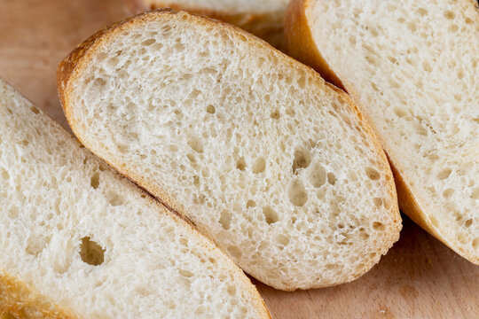 wheat loaf of bread close-up on the table