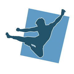 Silhouette of a male model doing martial art kick pose. Silhouette of a martial art kicking pose.