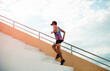 © bungearnsuk - Runner practicing climbing stairs To go compete in a marathon on a summer evening