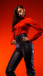 © EwaStudio - Mesmerizing Beauty in Red and Black. Beautifull and very flirty style model with a perfect body, red backround