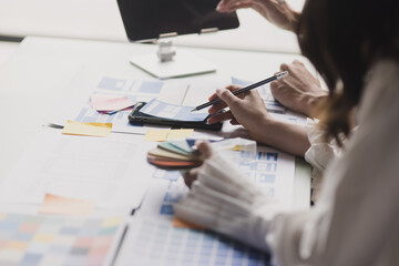 Business teamwork and working with UX developer and UI designer at table in modern office. Creative and development agency concept.