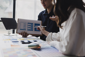 Business teamwork and working with UX developer and UI designer at table in modern office. Creative and development agency concept.