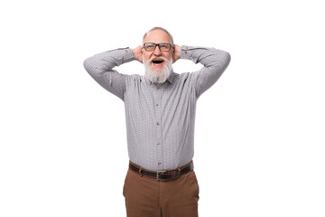 Wall Mural - portrait of charming 60 year old elderly business man with mustache and gray beard wearing glasses