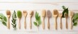 Eco friendly bamboo brushes for washing wooden scoops and spoon zero waste nature inspired flat lay Copy space image Place for adding text or design