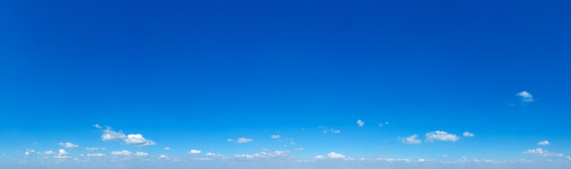 Wall Mural - Blue Sky background with tiny Clouds. Panorama background