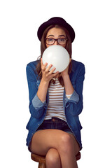 Canvas Print - Blowing, balloon and portrait of woman on chair on isolated, png and transparent background. Happy, fashion and person with decoration for party, birthday or celebration in trendy hipster clothes