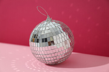 Wall Mural - Beautiful disco ball on a red background