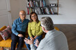 © ReeldealHD images - Senior retired couple with personal finance advisor