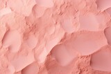 Fototapeta Dinusie -  a close up of a powdered surface with small holes in the middle of the surface and a light pink color.