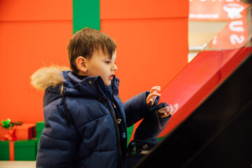 Boy looking at touch information panel