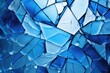 Abstract pattern of shattered blue glass. Texture and background.