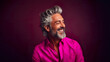 © DigitalDreamscape - Happy elderly fashion model with grey full hair, mature and happy smiling man in colorful close-up portrait | Generative AI