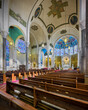 Interior nave and sanctuary of the historic St Benedict Catholic Church in downtown Terre Haute, Indiana