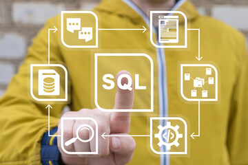 Wall Mural - man using virtual touch screen presses abbreviation: sql. sql ( structured query language ) code to 
