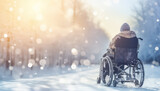 Fototapeta  - An old man in a wheelchair on a gurney outdoors in winter