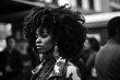 © Artem - Handsome black woman walking in the street, black and white candid street photography