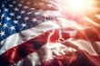 © Fotograf - A close up view of an American flag with the sun shining in the background. This patriotic image is perfect for showcasing national pride or celebrating American holidays