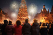 People enjoy Christmas, spending time in the town square with Christmas tree