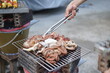 © kiattisak - Asian, American and African family parties with grilled seafood and beer drinks, BBQ