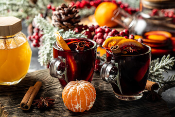 Wall Mural - Delicious mulled wine with spices and oranges, Traditional hot drink at Christmas