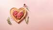 © Popovo - Creatively served juicy T-bone steak in the shape of a heart, in a romantic Valentine's Day style, with warm and soft colors on a light pink background.