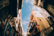 Street view in Palermo. Traditional old houses against blue sunny sky.