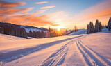 Fototapeta Natura - The day's last light fades over a peaceful, snow-blanketed ski slope and forest.
