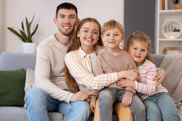 Sticker - Little children with their parents hugging on sofa at home