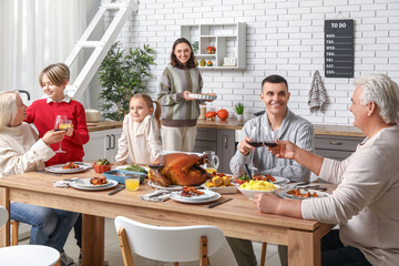 Poster - Happy family having dinner at festive table on Thanksgiving Day