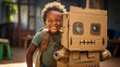 © Tierney - A young African boy making a robot out of cardboard