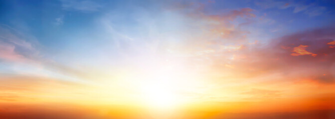 Wall Mural - beautiful orange sunset sunrise with clouds sky in nature.