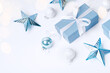 Christmas blue gifts with decorations on white background
