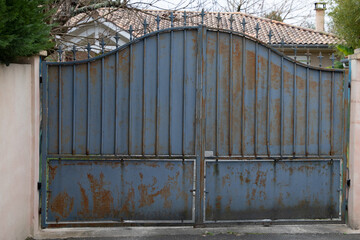 Wall Mural - door rust grey iron gate home classic aluminum portal rusty access of suburb house in street view