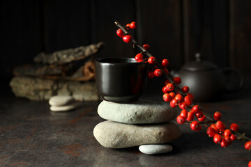 Wall Mural - Asian tea concept, cup on dark background.